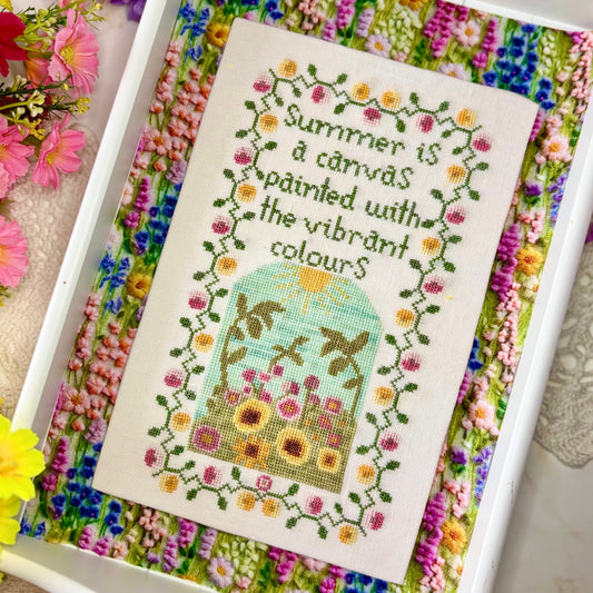 Summer in Bloom cross-stitch pattern featuring vibrant seasonal flowers