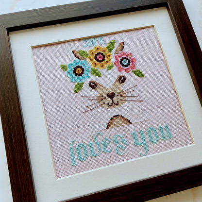 Some Bunny Loves You cross-stitch chart with cute bunny and florals – PDF or printed