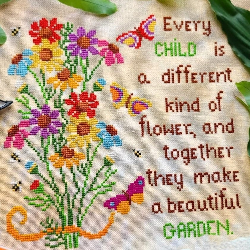 different Kind of Flower cross-stitch pattern on 32ct linen, bold floral design in DMC threads