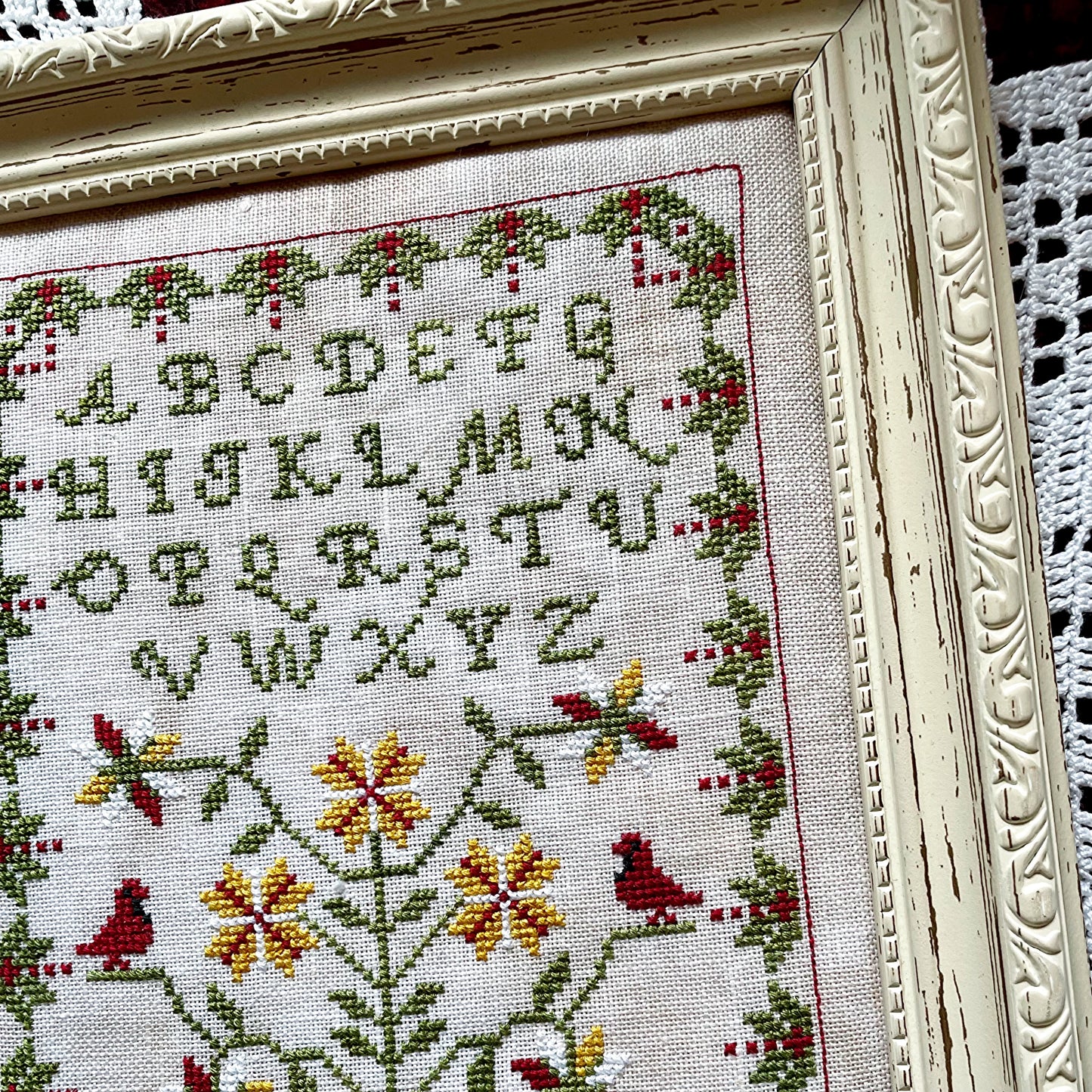 Winter Sampler cross-stitch chart with seasonal motifs – printed only