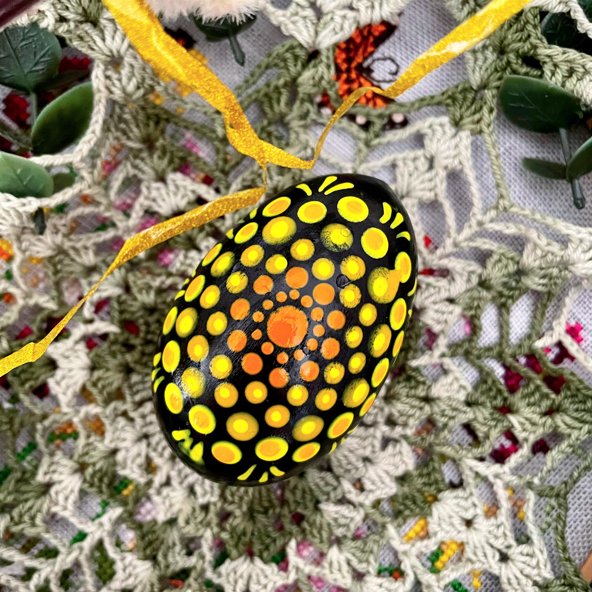 Close-up of hand-painted Easter eggs, showcasing unique designs and vibrant colors.