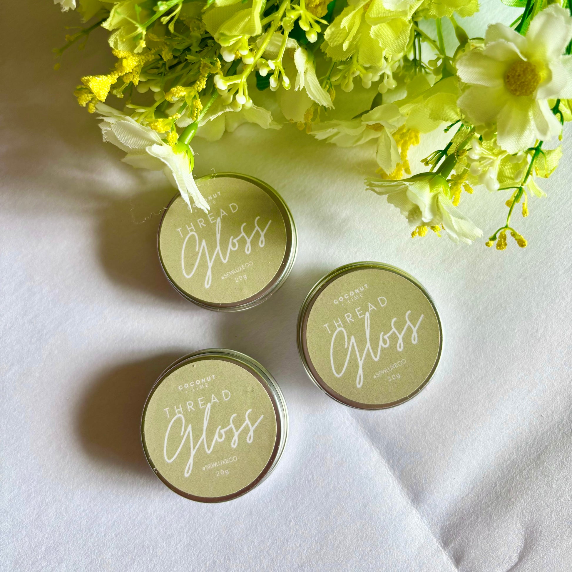 Coconut Lime Thread Gloss tin with embroidery floss