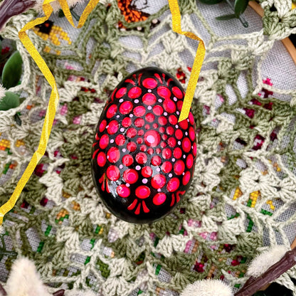 Close-up of hand-painted Easter eggs, showcasing unique designs and vibrant colors.