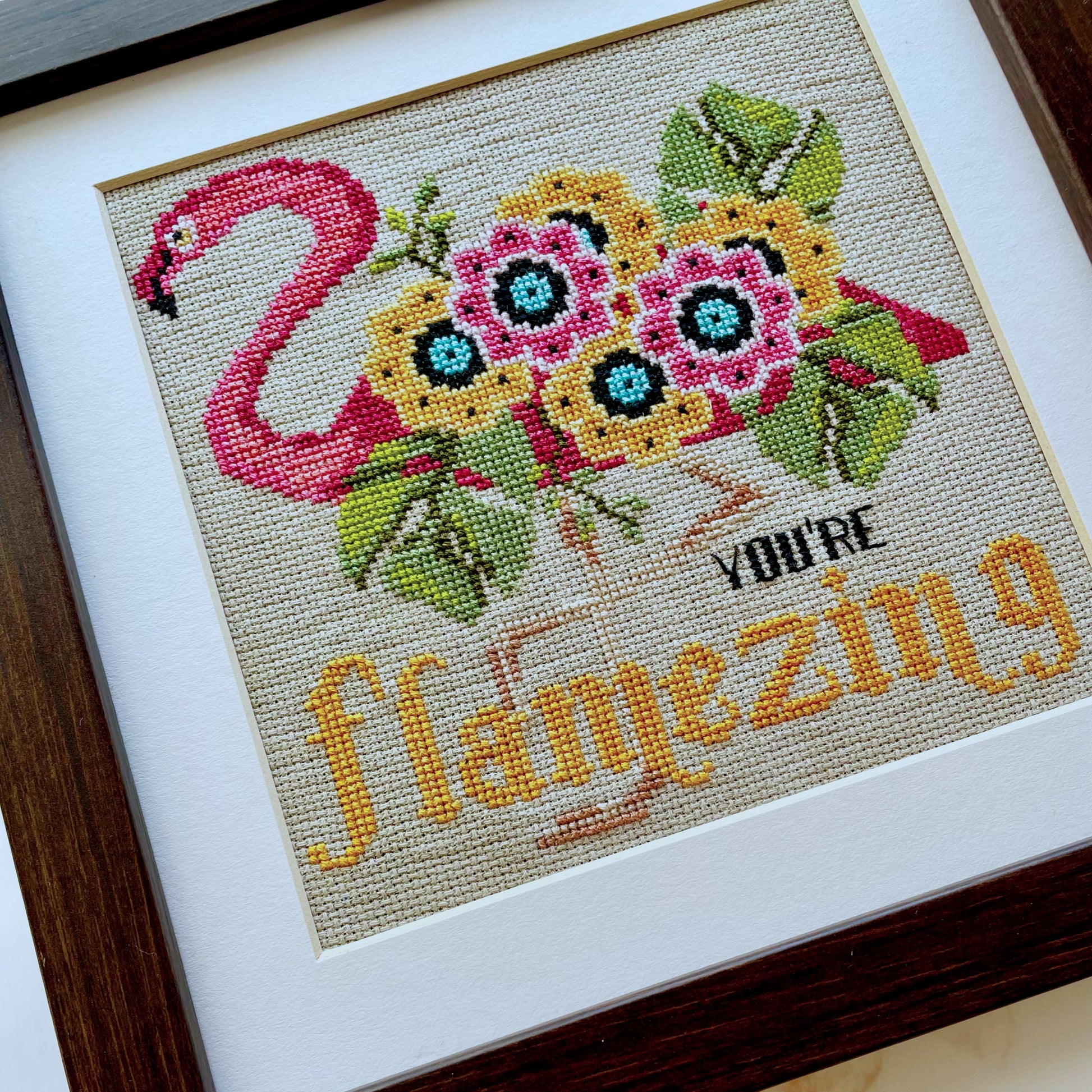You're Flamazing cross-stitch chart with pink flamingo and positive quote