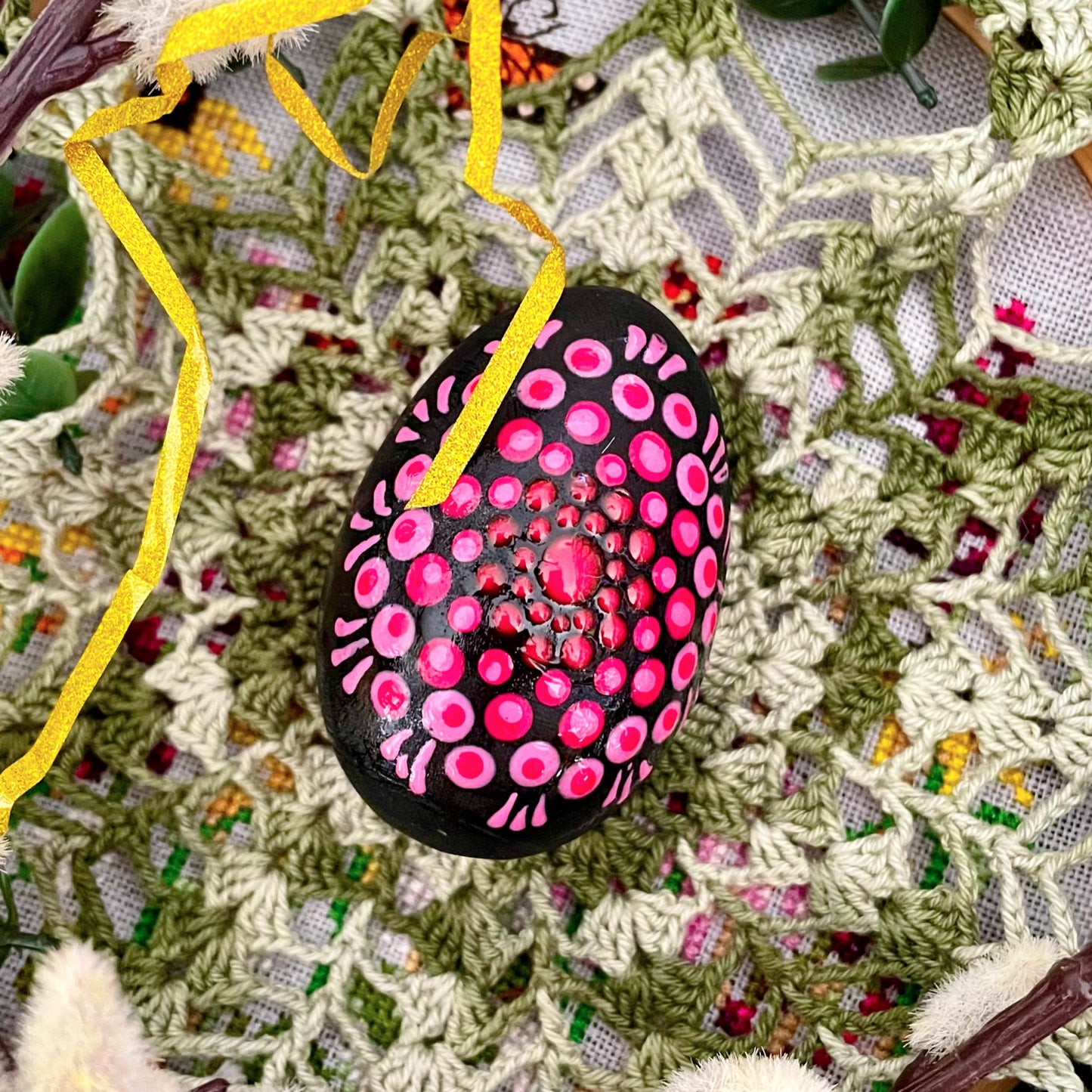 Close-up of hand-painted Easter eggs, showcasing unique designs and vibrant colors.