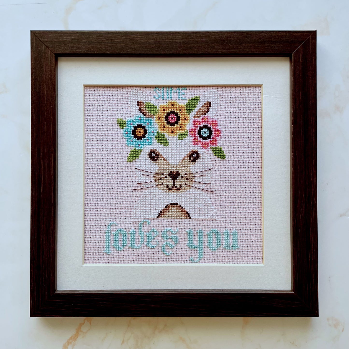 Some Bunny Loves You cross-stitch chart with cute bunny and florals – PDF or printed