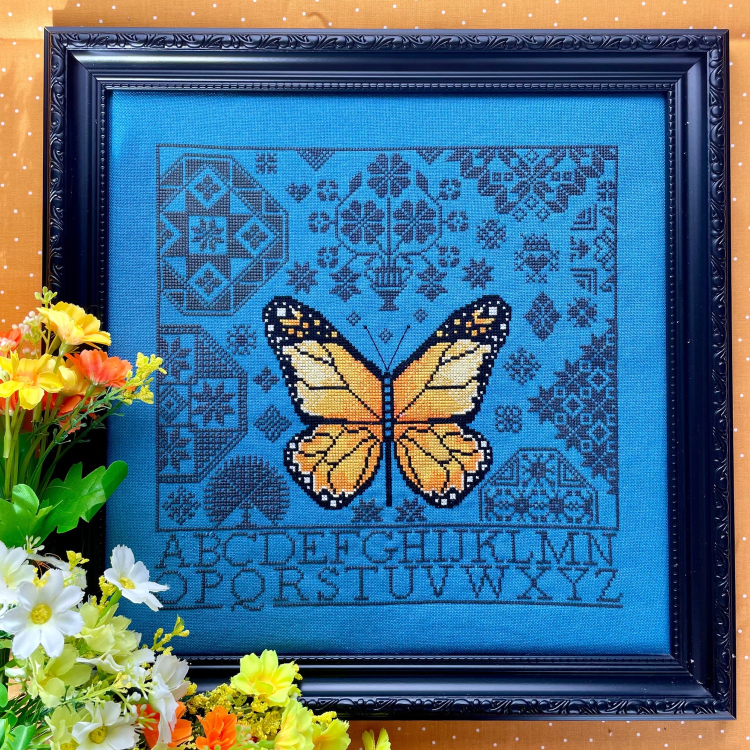 Monarch Quaker cross-stitch chart with butterfly and Quaker motifs – PDF or printed