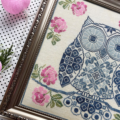 Whimsical Quaker sampler featuring an owl and decorative elements