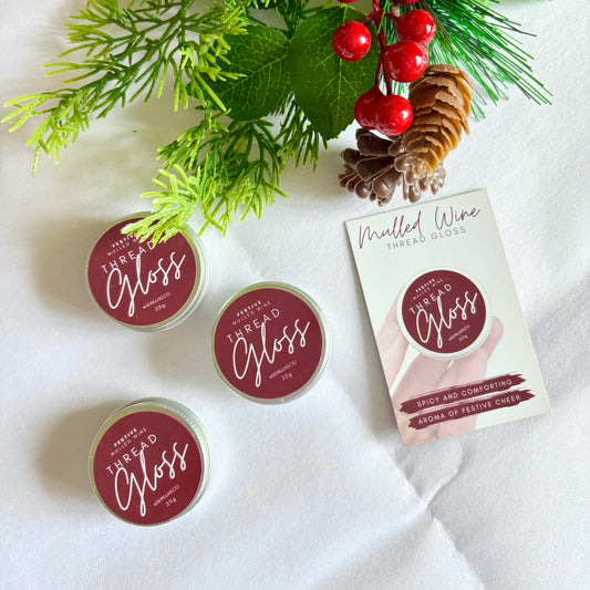 Mulled wine scented thread gloss for embroidery