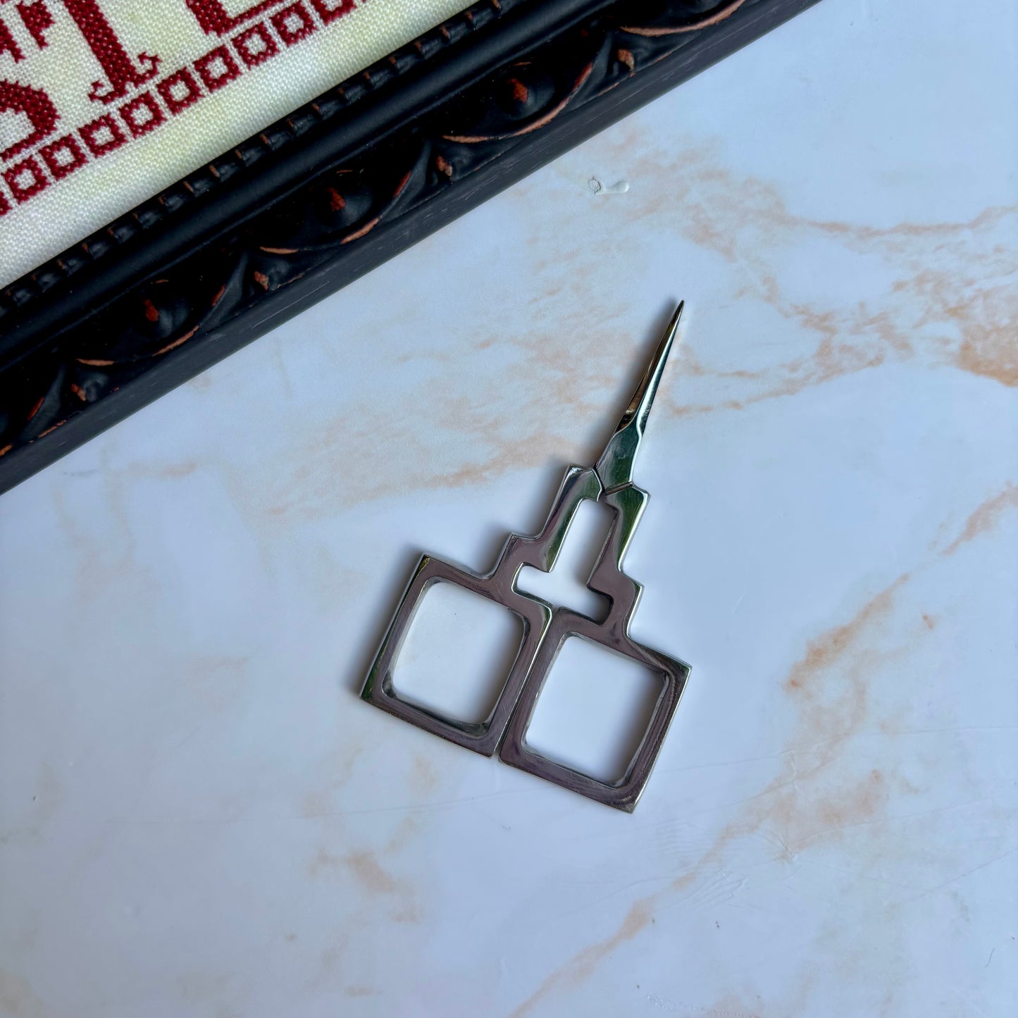 Compact oxbow‑shaped embroidery scissors by Kelmscott Designs