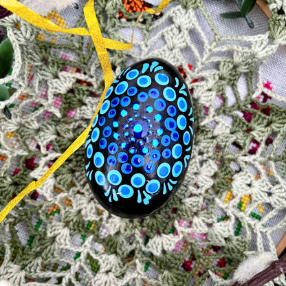 Close-up of hand-painted Easter eggs, showcasing unique designs and vibrant colors.