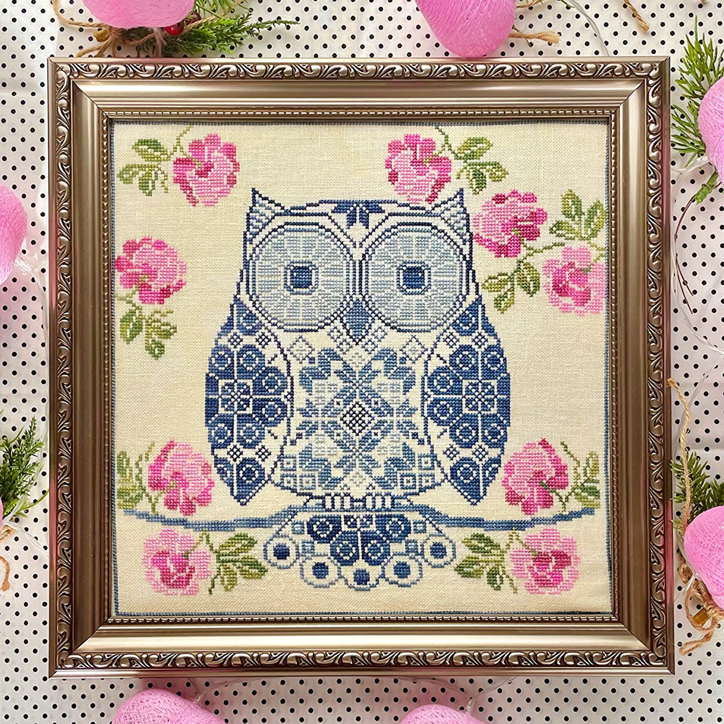 Whimsical Quaker sampler featuring an owl and decorative elements