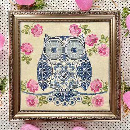 Whimsical Quaker sampler featuring an owl and decorative elements