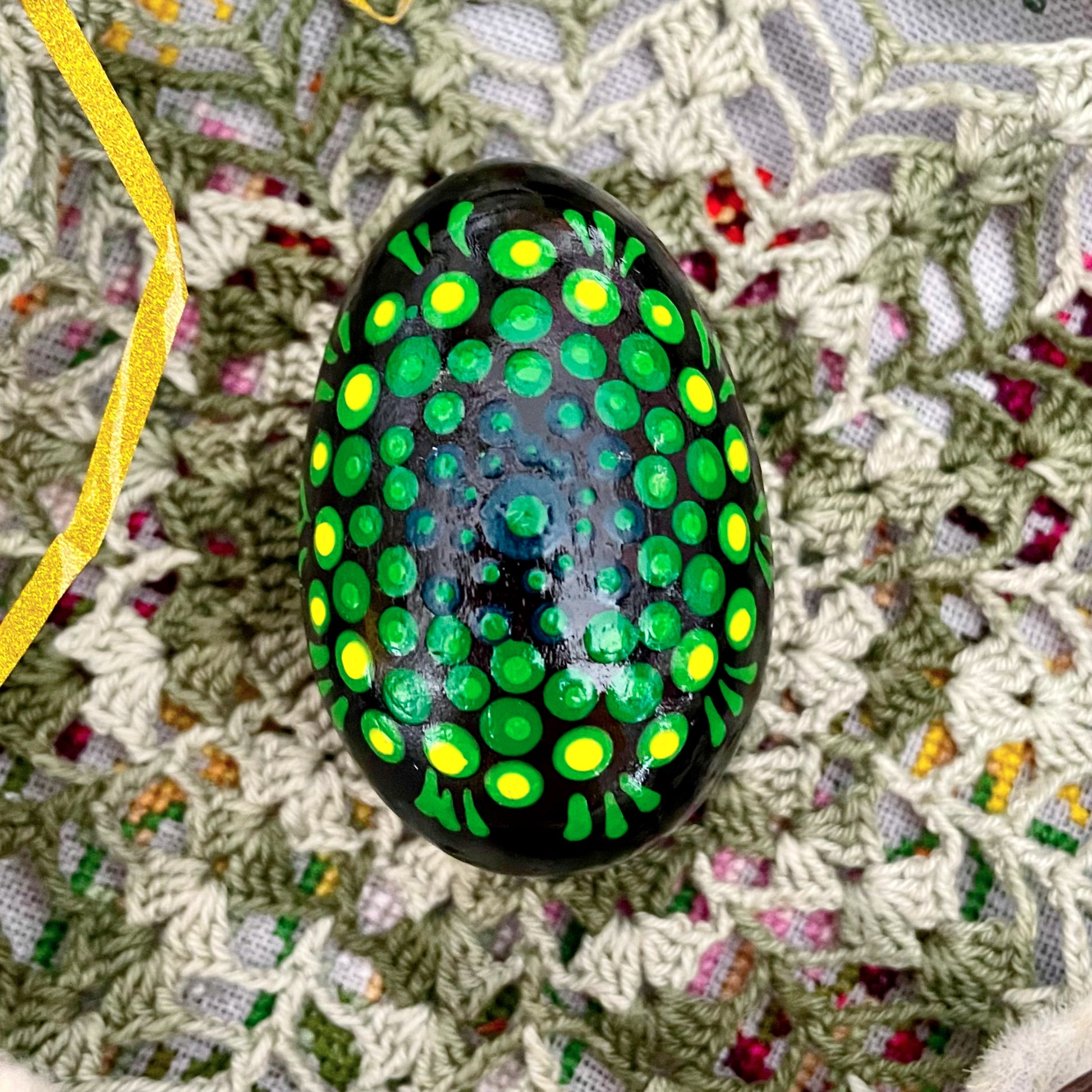 Close-up of hand-painted Easter eggs, showcasing unique designs and vibrant colors.