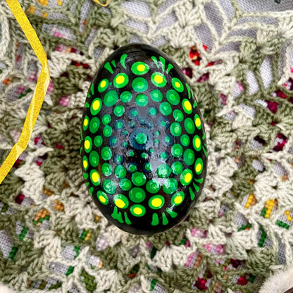 Close-up of hand-painted Easter eggs, showcasing unique designs and vibrant colors.