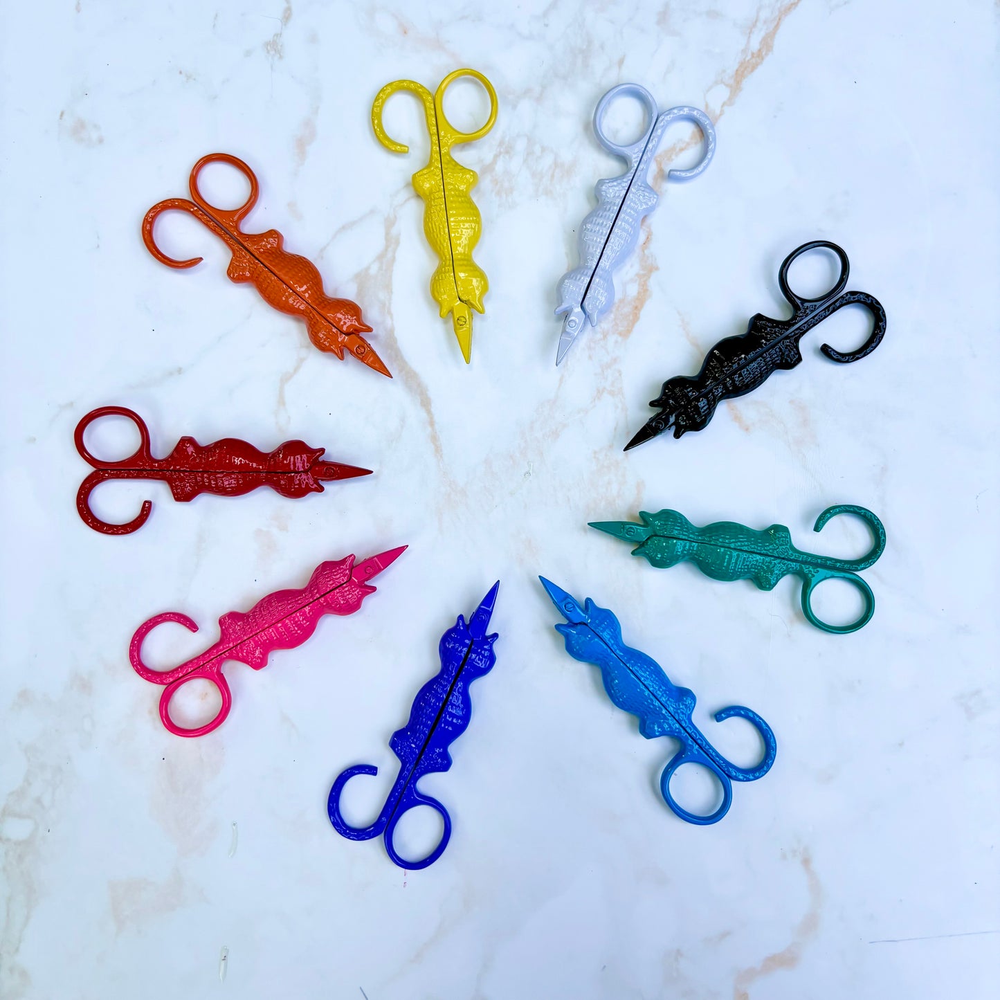 Cat Snips with tail finger loop and sharp stainless blades