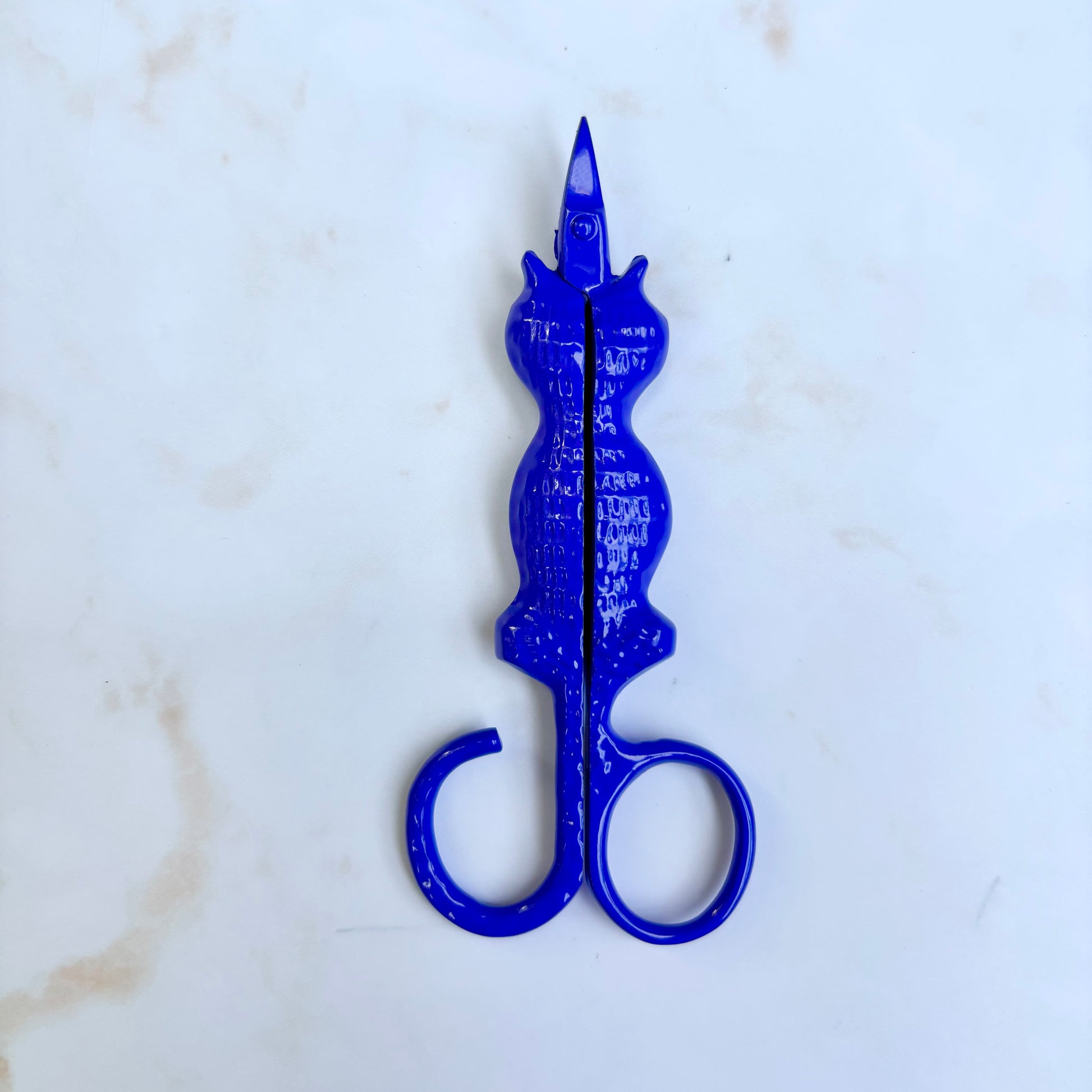 Cat Snips with tail finger loop and sharp stainless blades