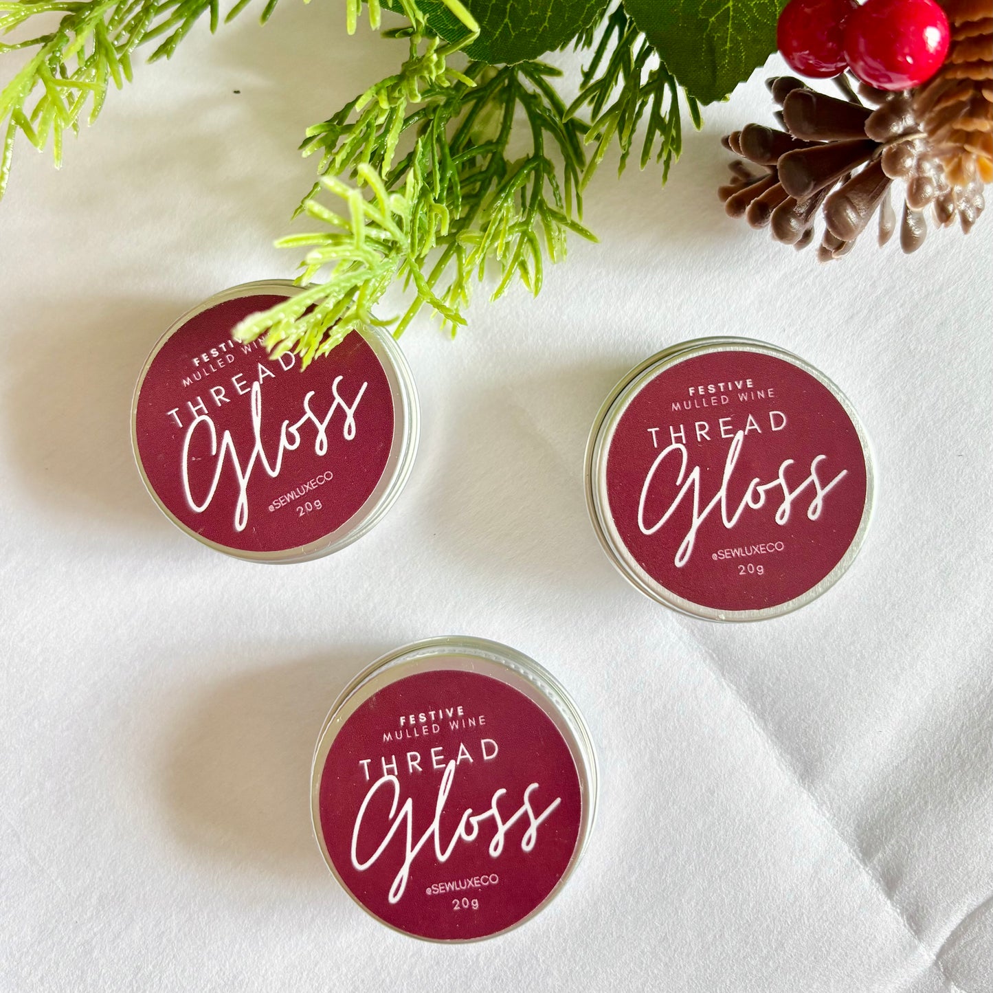 Mulled wine scented thread gloss for embroidery