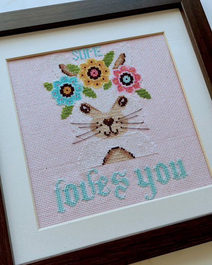 Some Bunny Loves You cross-stitch chart with cute bunny and florals – PDF or printed