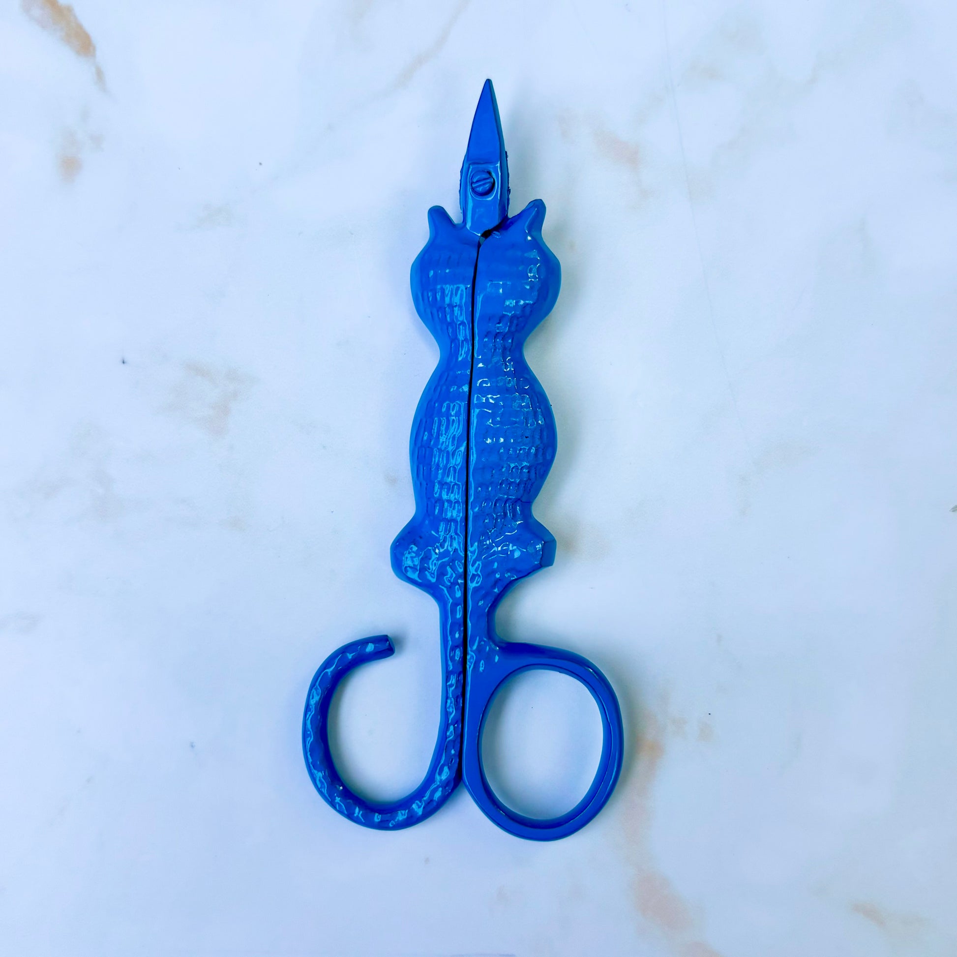 Cat Snips with tail finger loop and sharp stainless blades