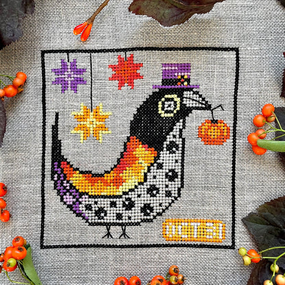 Halloween Folk Bird cross-stitch kit with pumpkins and folk-style motifs