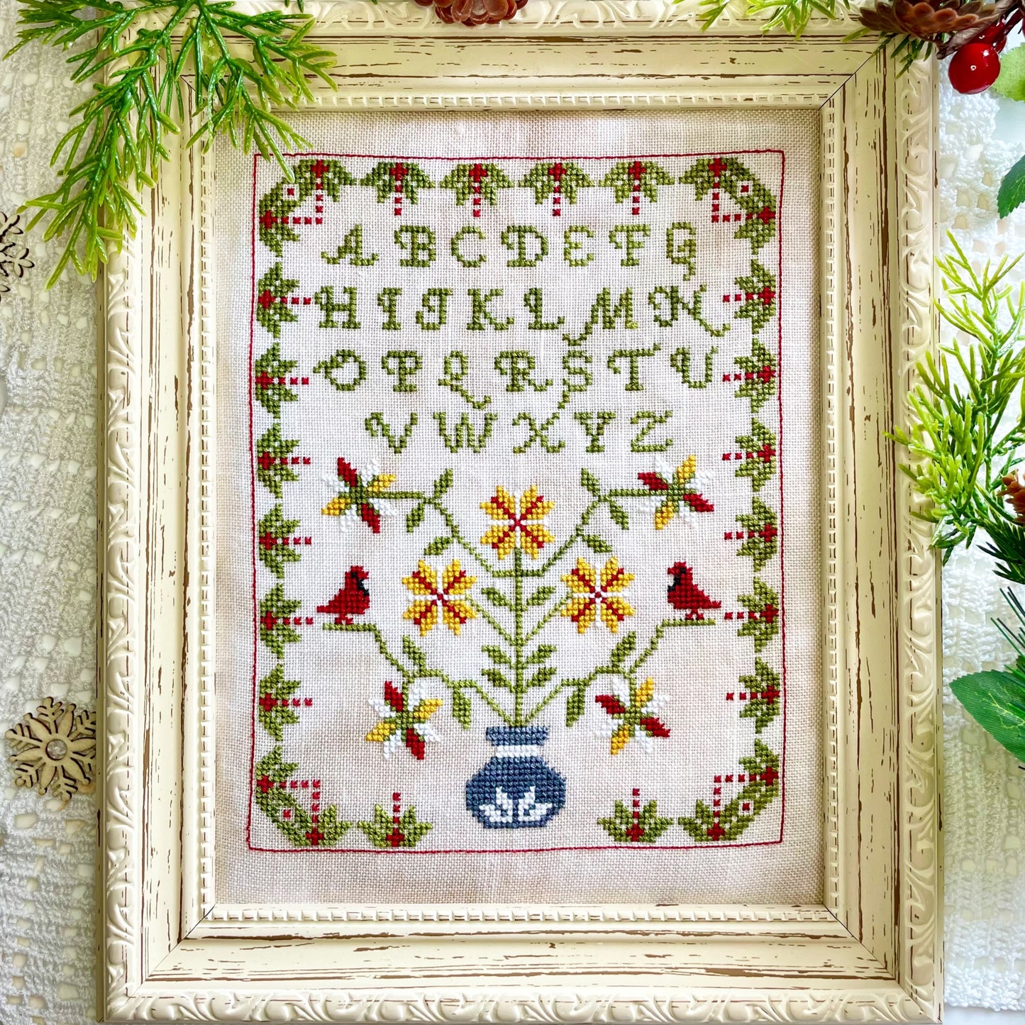 Winter Sampler cross-stitch chart with seasonal motifs – printed only