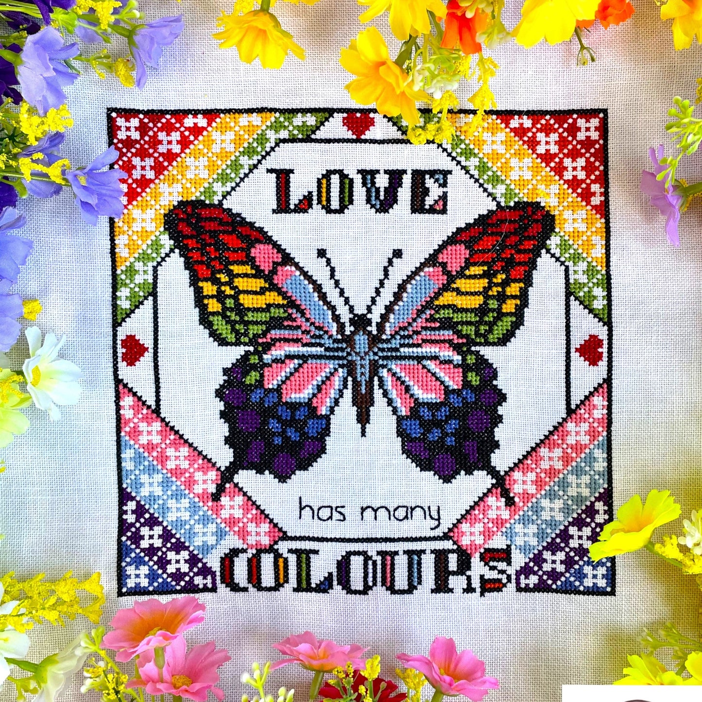 Love Has Many Colours cross-stitch chart with rainbow butterfly – printed only