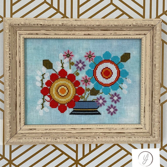 Bright symmetrical floral embroidery design for summer stitching